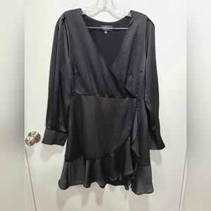 Long sleeve, black wrap-like Lulu's dress